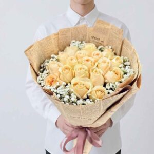 RY03-ช่อกุหลาบสีแชมเปญ-Champagne-Roses-ห่อกระดาษหนังสือพิมพ์วินเทจ